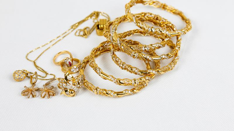 Joyería de oro y monedas para tasación